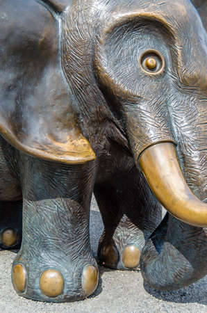 VIENNA, AUSTRIA - SEPTEMBER 1, 2013: Bronze elephant statue in front of the entrance to the Museum of Natural History in Vienna city centre, Austriaのeditorial素材