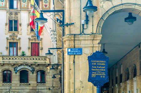 PORTUGALETE, SPAIN - JULY 7, 2021: Bilingual sign in Spanish and Basque, indicating the entrance to pedestrian streets of the historic center of Portugalete, Basque Country, Spainのeditorial素材