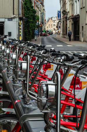 ANTWERP, BELGIUM - AUGUST 22, 2013:  Row of bicycles from the Velo company, a bike sharing service in Antwerp, Belgiumのeditorial素材