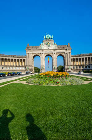 BRUSSELS, BELGIUM - AUGUST 21, 2013: View of the Cinquantenaire Arch constructed in 1905,  located in the Cinquantenaire Park(French for "Park of the Fiftieth Anniversary"), in the European Quarter in Brussels, Belgium.のeditorial素材