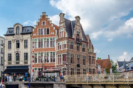 GHENT, BELGIUM - AUGUST 20, 2013: Urban scene, riverside in the city of Ghent, Belgiumのeditorial素材