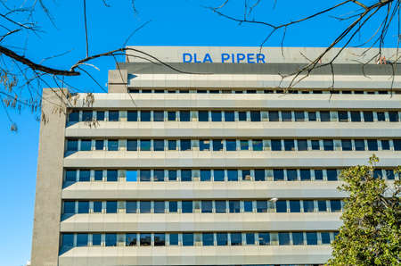 MADRID, SPAIN - JANUARY 12, 2022: DLA Piper headquarters on Paseo de la Castellana in Madrid, Spain. DLA Piper is a multinational law firm with offices in more than 40 countriesのeditorial素材