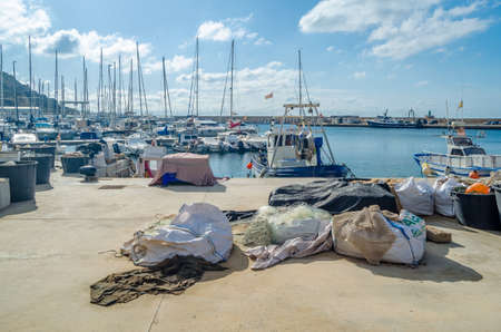 CALPE, SPAIN - JANUARY 26, 2022: Fishing port of the Mediterranean town of Calpe, Alicante province,...