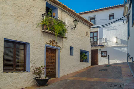 CALPE, SPAIN - JANUARY 27, 2022: View of colorful buildings and narrow streets, architecture in the historic center of the Mediterranean town of Calpe, Alicante province, Valencian Community, Spainのeditorial素材