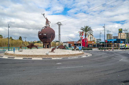 CALPE, SPAIN - JANUARY 24, 2022: Commercial area with various shops and fast food restaurants in...
