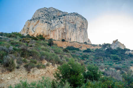 View of Penon de Ifach (Penyal d'Ifac in Valencian), a massive limestone outcrop emerging from the...