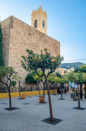 Church in the historic center of the Mediterranean town of Calpe, Alicante province, Valencian Community, Spainの写真素材
