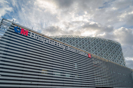 MOSTOLES, SPAIN - SEPTEMBER 22, 2021: "Rey Juan Carlos" University Hospital, located in the Madrid town of Mostoles, Spain, a modern building designed by the Rafael de La-Hoz studio, inaugurated in 2012のeditorial素材