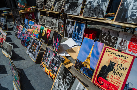 LILLE, FRANCE - AUGUST 17, 2013: Old magazines, books, and miscellaneous items at a flea market at...