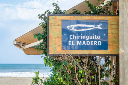 ESTEPONA, SPAIN - OCTOBER 12, 2021: Chiringuito on the beach of Estepona, on the Costa del Sol, Malaga province, southern Spain. A "chiringuito" is a small bar, selling drinks, tapas and sometimes meals, in a more or less provisional building, often on a のeditorial素材