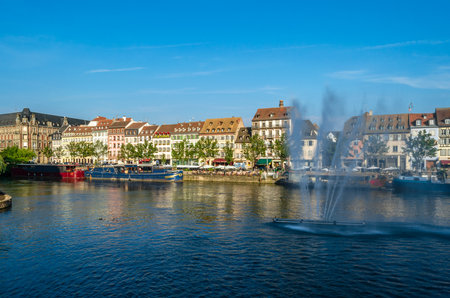 STRASBOURG, FRANCE - AUGUST 29, 2013: View of buildings on the canal bank in Strasbourg, Alsace, Franceのeditorial素材