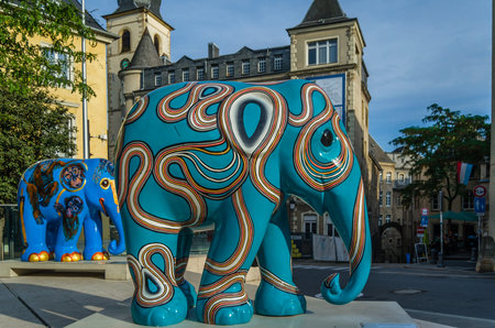 LUXEMBOURG CITY, LUXEMBOURG - AUGUST 27, 2013: Colorful elephant statue in Luxembourg, part of "Elephant parade", an open-air art exhibition. The funds raised during the parade goes to the "Asian Elephant Foundation", which is dedicated to the protection のeditorial素材