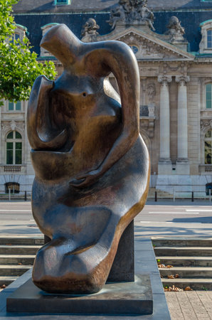 LUXEMBOURG CITY, LUXEMBOURG - AUGUST 27, 2013: Statue "Mother and Child", representing a mother and her child, created in 1983 by the sculptor Henry Moore, located in Place des Martyrs In Luxembourg Cityのeditorial素材
