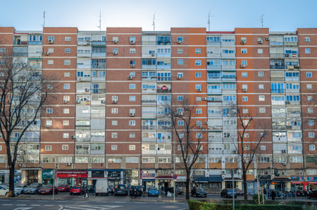 MADRID, SPAIN - DECEMBER 27, 2021: Facade of a building in Barrio del Pilar, a residential neighborhood in Madrid, Spainのeditorial素材