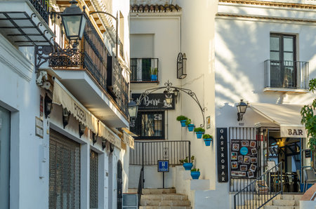 MIJAS, SPAIN - OCTOBER 9, 2021: View of streets and typical architecture in the town of Mijas,...