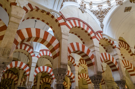 CORDOBA, SPAIN - FEBRUARY 15, 2014: Columns and double-tiered arches in the interior of the Mosque-Cathedral of Cordoba, Andalusia, southern Spainのeditorial素材