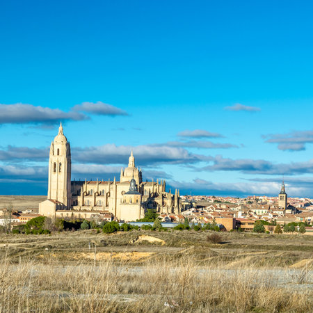View of Segovia cathedral from the outskirts of the city, Castile and Leon, Spainの写真素材