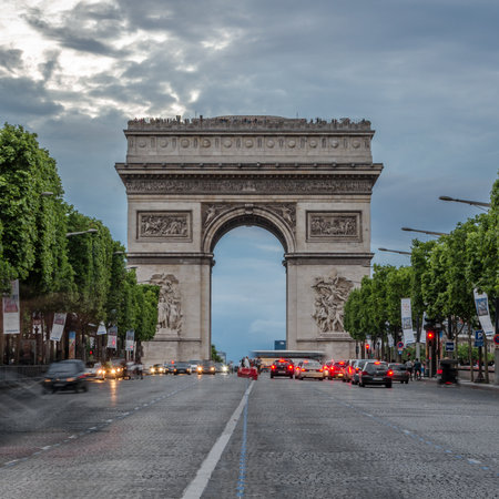 PARIS, FRANCE - JULY 5, 2014: Arc de Triomphe, famous landmark of Paris, seen from Champs-Elysees Avenueのeditorial素材