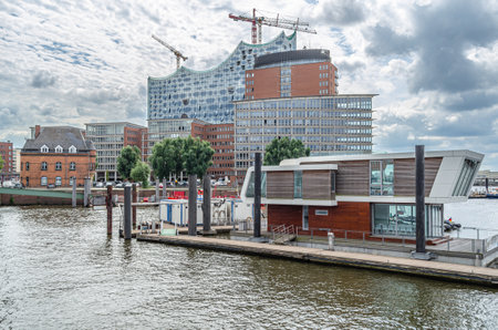 HAMBURG, GERMANY - JULY 7, 2014: View of the Elbphilharmonie (Elbe Philharmonic Hall) during construction, in 2014. It is a concert hall in Hamburg, Germany, opened in 2017. The modern building was designed by the Swiss architecture firm Herzog & de Meuroのeditorial素材