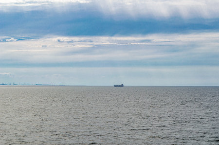 Seascape, with calm sea and partly cloudy sky