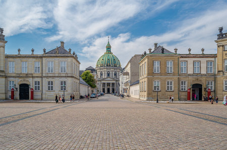 COPENHAGEN, DENMARK - JULY 8, 2014: Amalienborg palace, the official residence for the Danish royal family in Copenhagen, Denmark. Consists of four identical Rococo palaces around an octagonal courtyard; in the centre of the square is a monumental equestrのeditorial素材