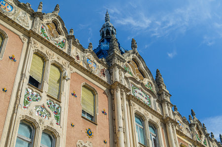 SATU MARE, ROMANIA - SEPTEMBER 23, 2019: Facade of the Dacia Hotel in the city of Satu Mare, Romania, during renovation works; built in 1902 in Hungarian Secession style, today is private propertyのeditorial素材