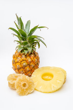 Pineapple, fresh and dried pineapple slices on white backgroundの写真素材