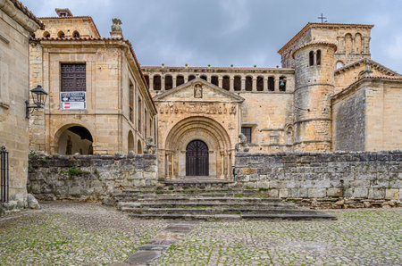 View of the Collegiate church and cloister of Santa Juliana in the town of Santillana del Mar,...