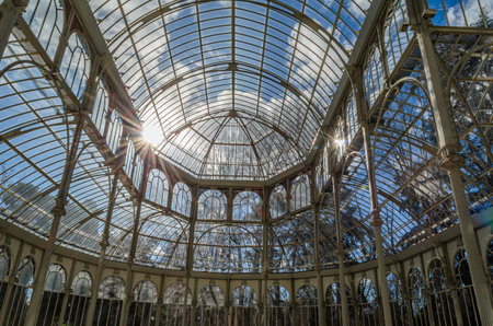 MADRID, SPAIN - FEBRUARY 1, 2014: Detail of Palacio de Cristal (Glass Palace), a metal and glass structure located in the Retiro Park in Madrid, Spain, built in 1887 for the Philippines Exposition, it belongs to the Reina Sofia Museumのeditorial素材