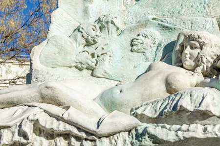 MADRID, SPAIN - JANUARY 31, 2014: Detail of the lower part of the Monument to Francisco de Goya, in Madrid, Spain, where scenes alluding to Goya's most famous works are carved in reliefのeditorial素材