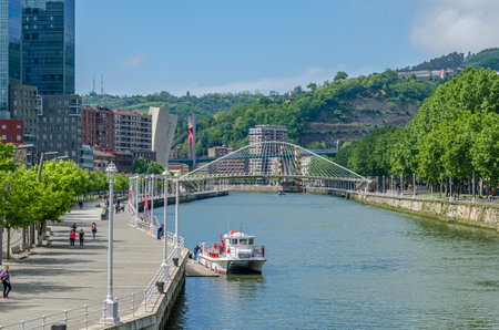 BILBAO, SPAIN - MAY 10, 2014: Cityscape, view of buildings on the banks of the Nervion River in Bilbao, Basque Country, Spainのeditorial素材