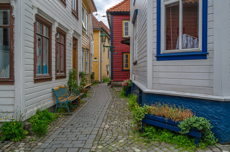 BERGEN, NORWAY - JULY 17, 2014: Narrow streets with colorful wooden houses in the city of Bergen, Norwayのeditorial素材