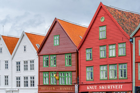 BERGEN, NORWAY - JULY 15, 2014: Colorful facade of the wooden houses of Bryggen, in Bergen, Norway. Bryggen is a UNESCO World Cultural Heritage site since 1979のeditorial素材