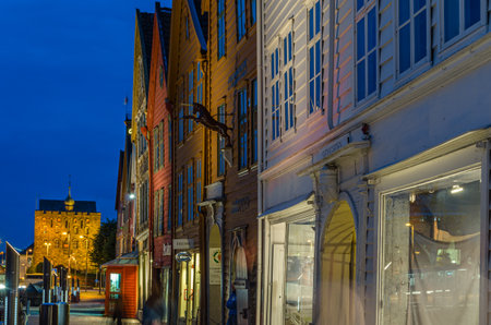 BERGEN, NORWAY - JULY 17, 2014: View at dusk of the colorful facade of Bryggen wooden houses, in Bergen, Norway. Bryggen is a UNESCO World Cultural Heritage site since 1979のeditorial素材