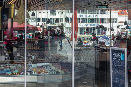 BERGEN, NORWAY - JULY 17, 2014: Shop window of a local food products store in Bergen, Norwayのeditorial素材