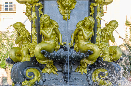 Fountain of the Muses in the Plaza de Navarra in Huesca, Aragon, Spain. This is a two-tiered fountain, commissioned and built in 1885.の写真素材