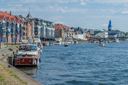 FREDRIKSTAD, NORWAY - JULY 11, 2014: Boats on the river in the city of Fredrikstad, Norwayのeditorial素材
