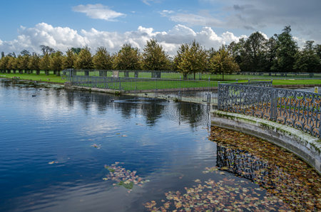 MOLESEY, UNITED KINGDOM - OCTOBER 9, 2014: Gardens at Hampton Court Palace, a royal palace in the London Borough of Richmond upon Thames, managed by Historic Royal Palacesのeditorial素材