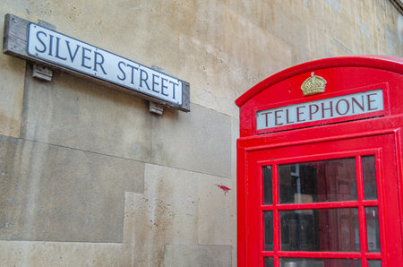 CAMBRIDGE, UNITED KINGDOM - OCTOBER 11, 2014: Typical English red telephone booth in the city of...