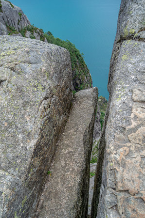 View of rock formations on the route to Preikestolen (The Pulpit Rock), a tourist attraction in Rogaland county, Norway, a steep cliff which rises 604 metres above Lysefjordenの写真素材