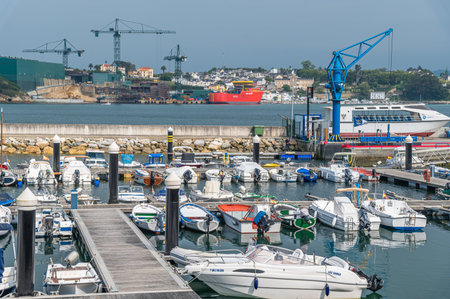 RIBADEO, SPAIN - AUGUST 30, 2022: View of the port of Ribadeo (Galicia), with the shipyards of the...