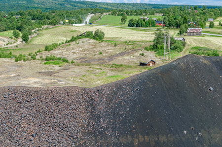 Slag mountains in the mining town of Roros, Norway. Slag is a by-product of copper smelting.の写真素材