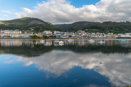 VIVEIRO, SPAIN - SEPTEMBER 2, 2022: View of buildings on the shore of the port of Viveiro, Lugo...