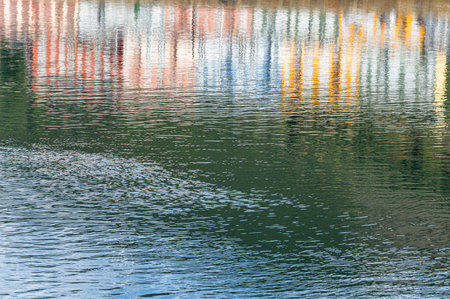 Detail of colorful facades reflected in the water in a portの写真素材
