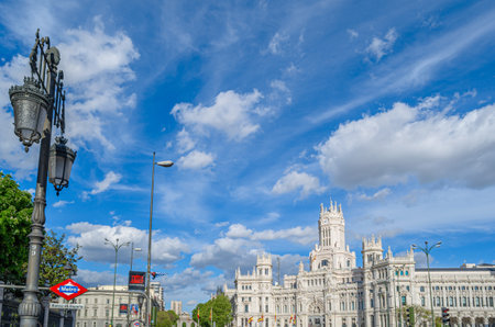 MADRID, SPAIN - APRIL 19, 2015: View of Plaza de Cibeles (Cibeles Square) in central Madrid, Spain, with the iconic Palacio de Cibeles (Cybele Palace)のeditorial素材