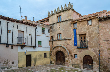 SIGUENZA, SPAIN - DECEMBER 27, 2014: Facade of the Casa del Doncel (Palace of the Marquises of Bedmar), a civil Gothic-style building located in the medieval quarter of Siguenza, Castilla la Mancha, Spain. It belongs to the University of Alcala de Henaresのeditorial素材