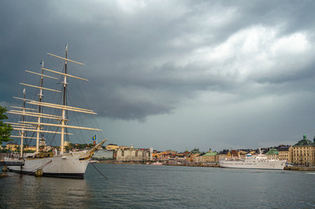 STOCKHOLM, SWEDEN - JULY 27, 2014: View of Stockholm, Sweden, with storm clouds. In the foreground...