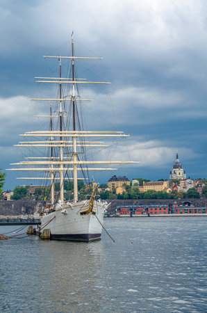 STOCKHOLM, SWEDEN - JULY 27, 2014: View of Stockholm, Sweden, with storm clouds. In the foreground...