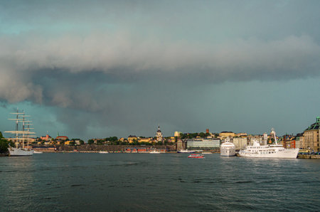 STOCKHOLM, SWEDEN - JULY 27, 2014: View of ships on the Stockholm embankment during a severe summer stormのeditorial素材