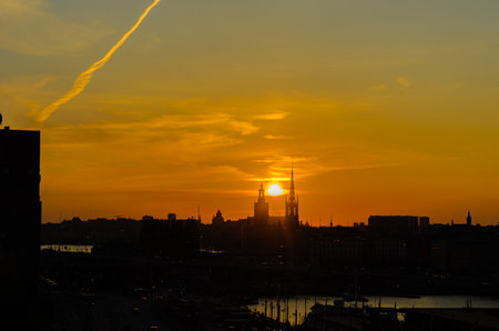 Silhouette of buildings on the waterfront at dusk in Stockholm, Swedenのeditorial素材